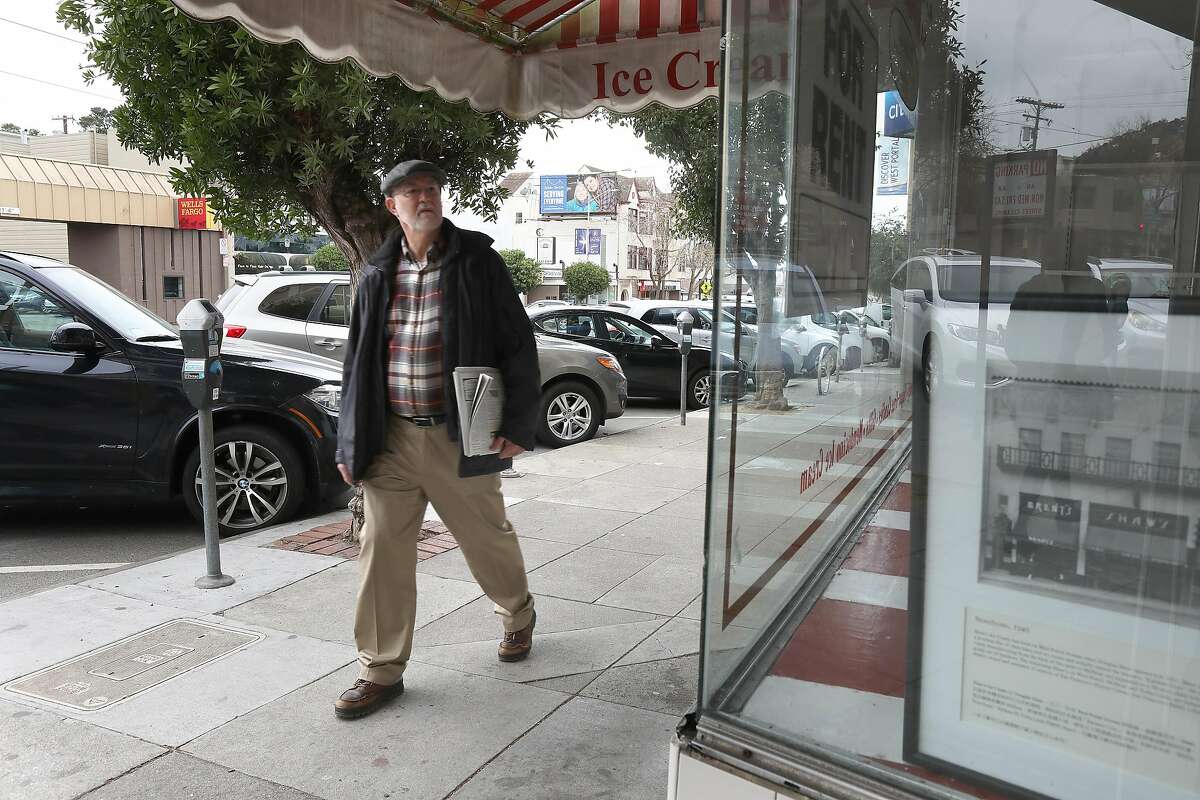 Mark Donnell passes by West Portal candy shop Shaws closes after 89 years in business seen on Friday, Feb. 14, 2020, in San Francisco, Calif. He�s been visiting the Shaws for the past 10 years.