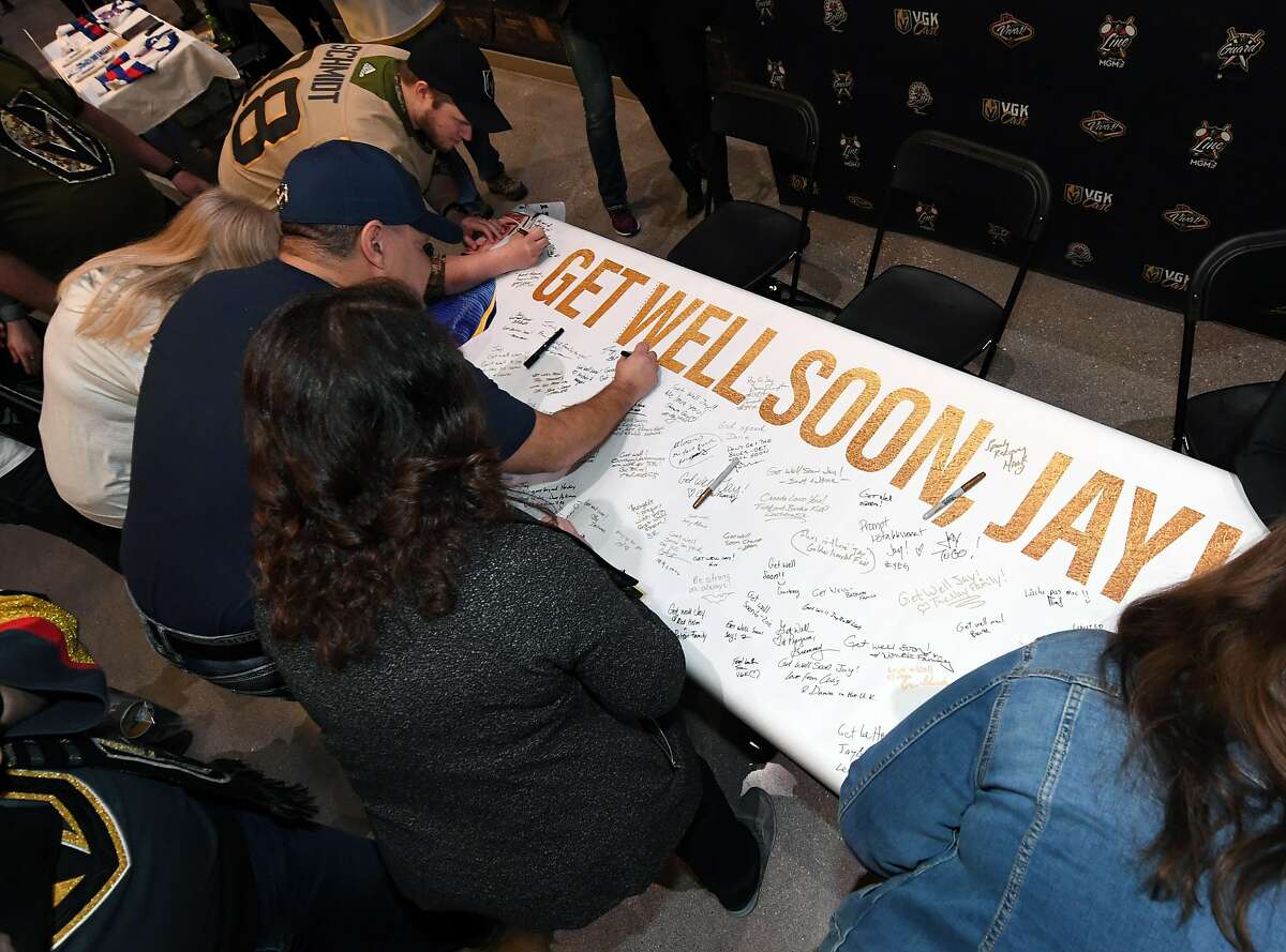 LAS VEGAS, NEVADA - FEBRUARY 13: Fans sign a banner for St. Louis Blues defenseman Jay Bouwmeester before a Blues game against the Vegas Golden Knights at T-Mobile Arena on February 13, 2020 in Las Vegas, Nevada. Bouwmeester experienced a cardiac episode during the team's previous game against the Anaheim Ducks on February 11. (Photo by Ethan Miller/Getty Images)