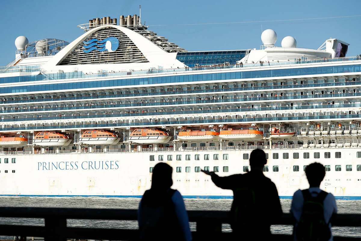 The Grand Princess passes Pier 39 as it arrives from Hawaii in San Francisco, Calif., on Tuesday, February 11, 2020.