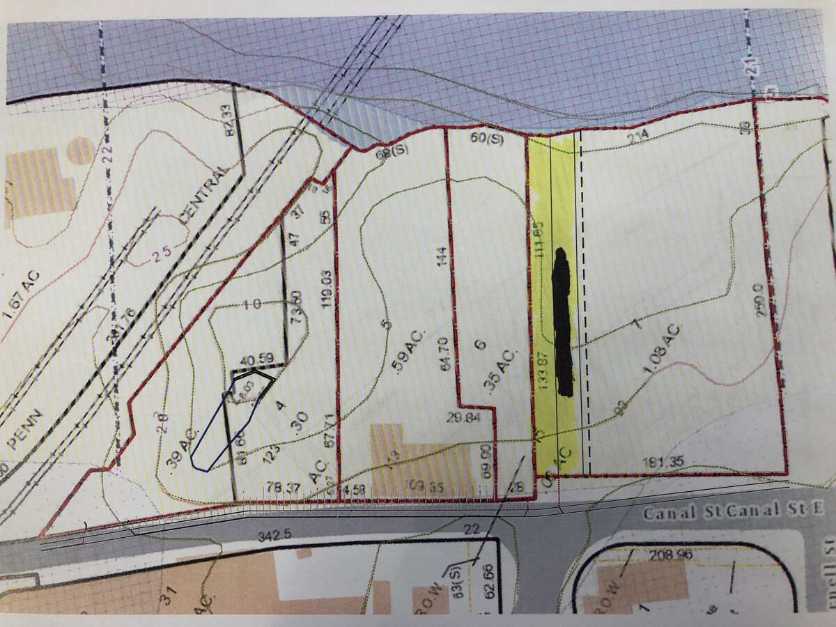 Officials are one step closer to selling city property along Canal Street — four parcels formerly owned by the Chromium Process Co. — as part of the downtown’s continued revitalization. Lots 3 to 6, with a portion of 7 which is shaded, are up for sale.