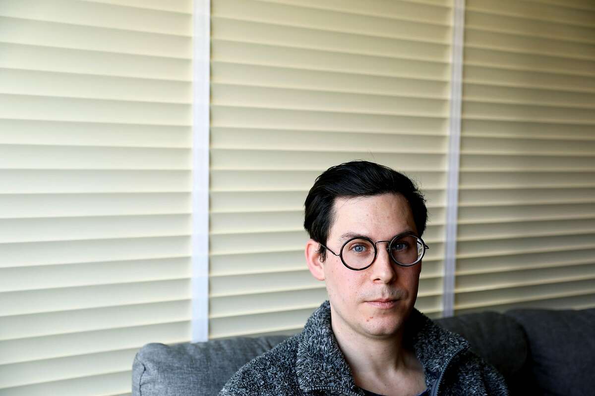 Shaun Dunn, 38, poses for a portrait in his home in San Francisco, Calif., on Wednesday, January 1, 2019. Dunn, a 3D artist, is $400k in debt to the Academy of Art University, from which he holds an MFA and a BFA, and hopes to land a job in his design field. "I think Walt Disney has been a big inspiration for me and his story just because, like I mentioned, he hit rock bottom and his main character was stolen, his employees were stolen from him and he didn't know how to protect himself when he was starting out. Later he created, he and his team created an amazing character - Mickey Mouse - and he ended up really changing the world with his company," Dunn said. "It just makes me feel inspired to keep going no matter where I am and how hard I hit bottom, I know that, you know, what goes up must go down and vice versa. Everything is just fluctuates and I believe that I will eventually go up."