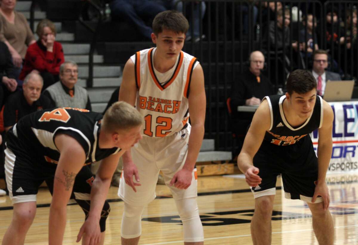 With the game tied 52-52, Dylan Kadar sunk a game-winning, half court buzer-beat to put Harbor Beach over Ubly by a 55-52 margin on Friday, Feb. 14.