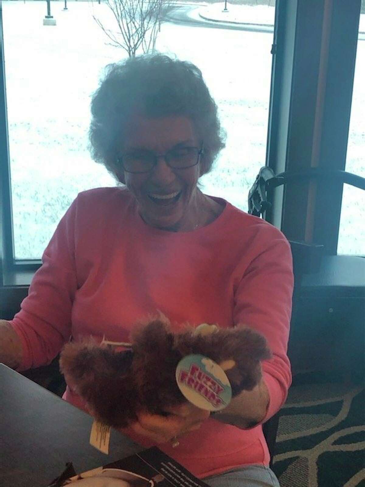 Members of the Salvation Army's after school program surprised residents of Primrose with stuffed animals in a recent visit. (Photo provided)