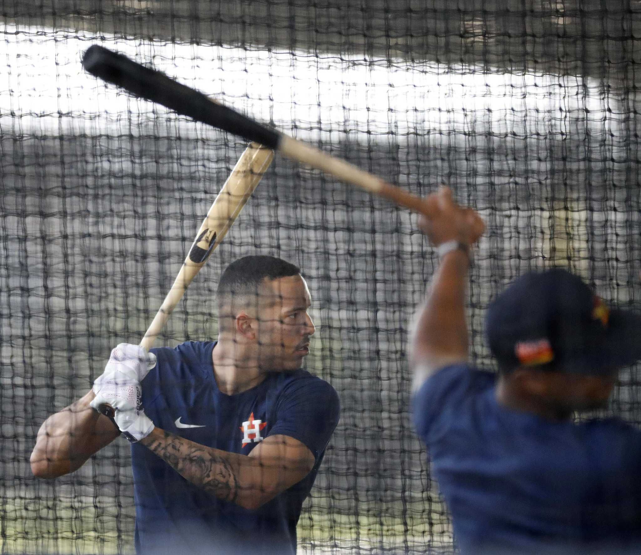 Astros' Jose Altuve shows off tattoo during spring training to back Carlos  Correa's claims 