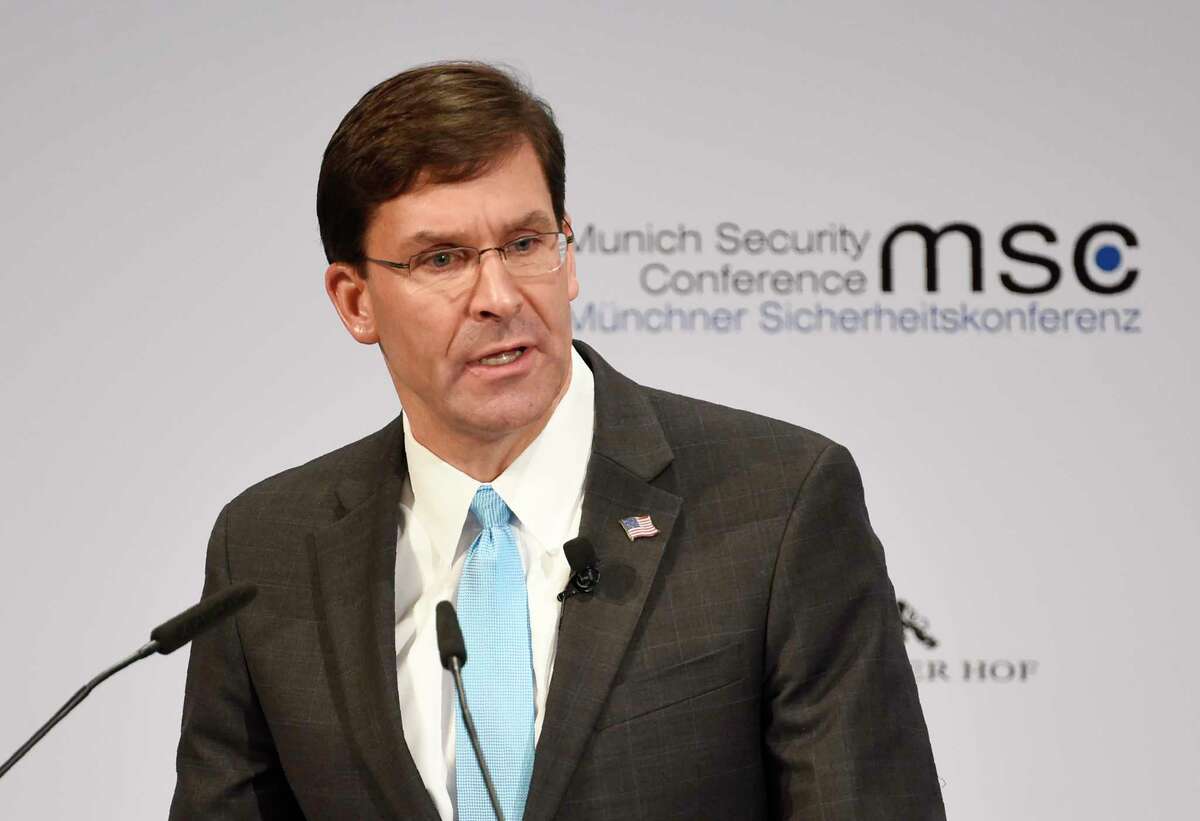 U.S. Secretary for Defense Mark Esper speaks on the second day of the Munich Security Conference in Munich, Germany, Saturday, Feb. 15, 2020. (AP Photo/Jens Meyer)