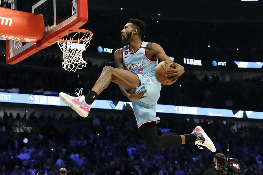 Jones gets locked in during a slam. Celebrating his 23rd birthday, he had a birthday cake and Heat teammate Ben Adebayo on the court for his first dunk. Photo: Nam Y. Huh / Associated Press