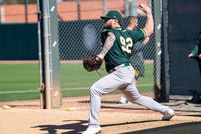 Hall of Famer Randy Johnson chats to A's Manaea, Luzardo and lookalike Puk