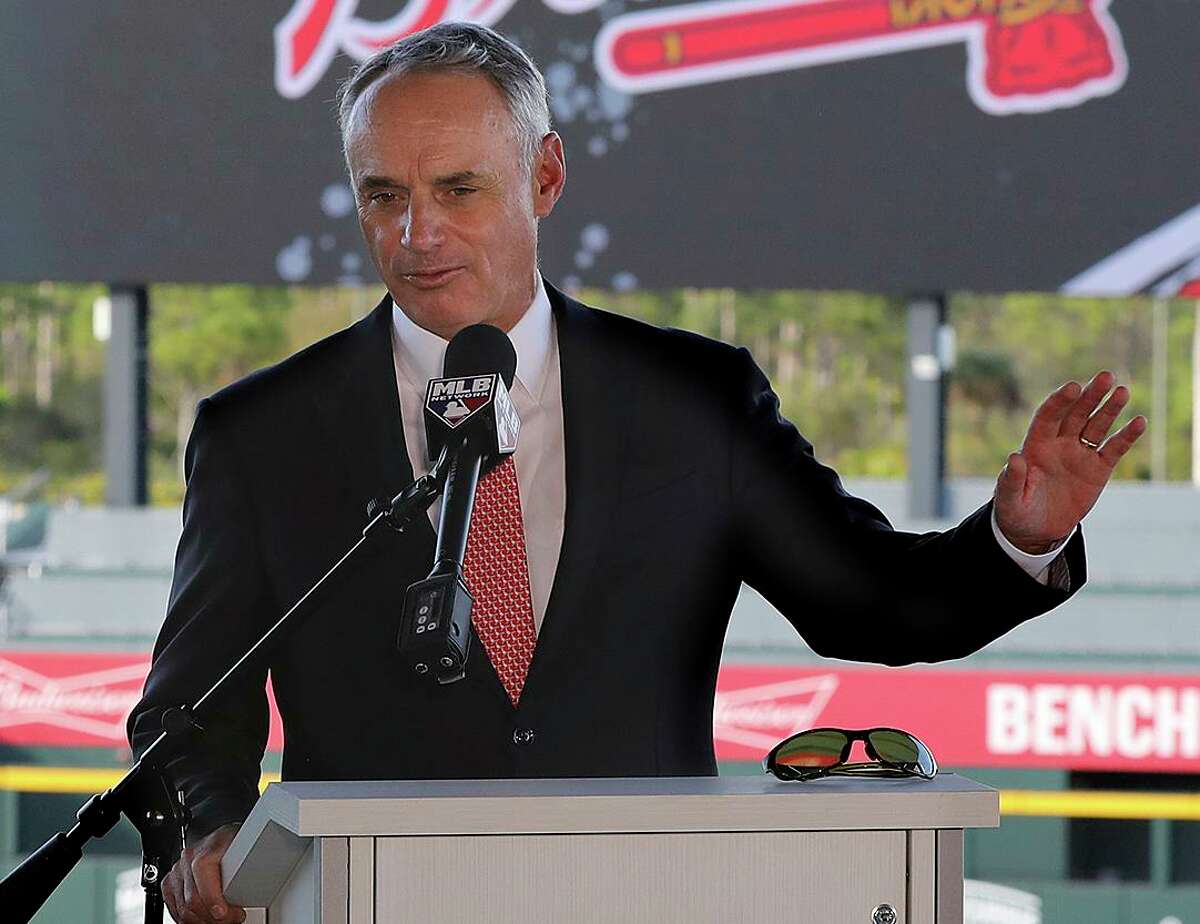 MLB commissioner Rob Manfred takes questions about the Astros during a Sunday news conference at the Atlanta Braves’ spring training facility in North Port, Fla.