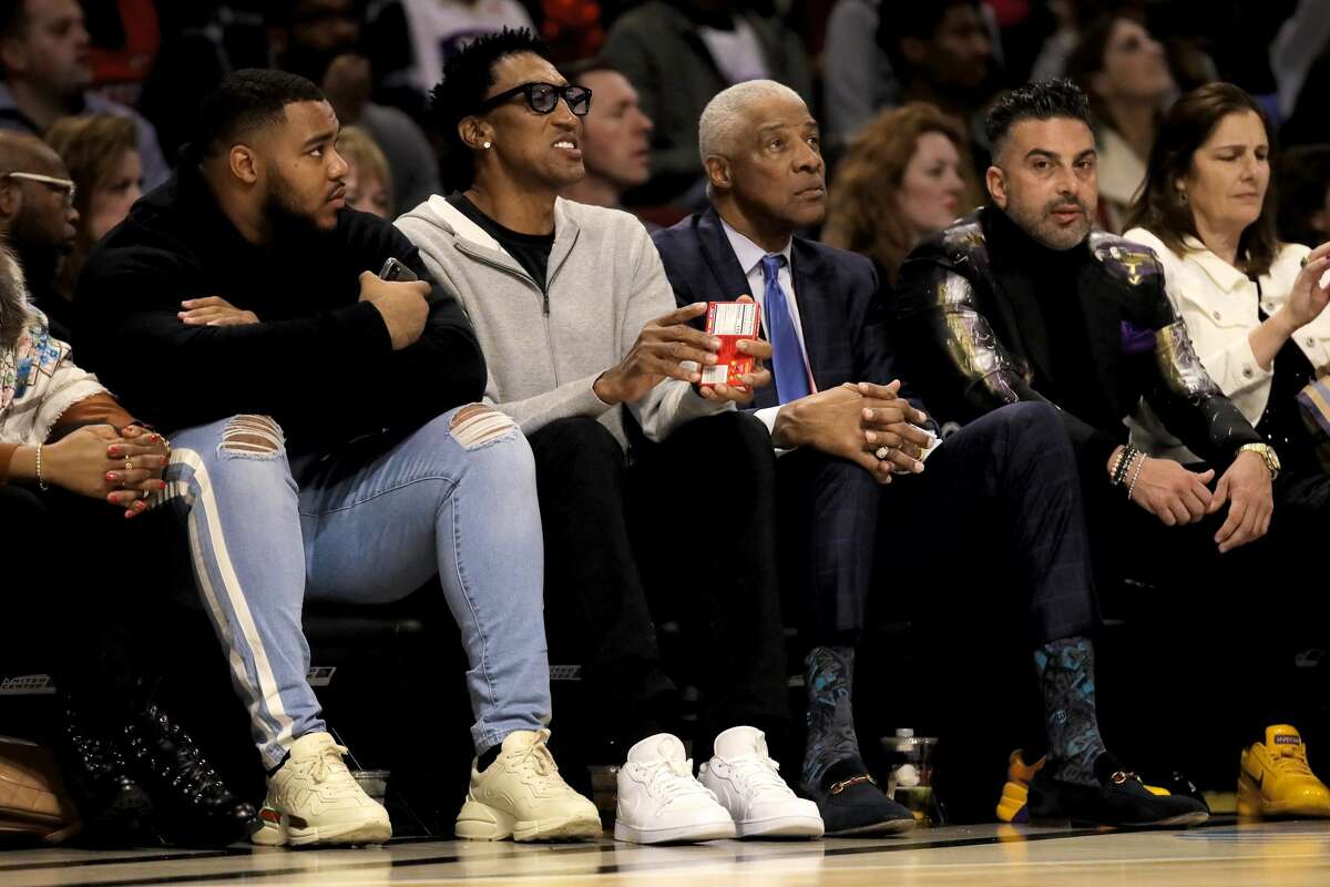 Celebrities sitting courtside at the NBA AllStar Game