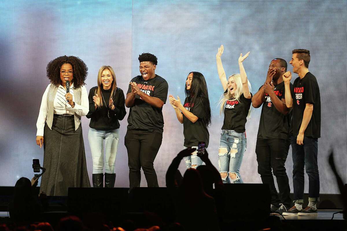 Oprah Winfrey speaks with the cast of Netflix's "Cheer", (L-R) Monica Aldama, Jerry Harris, Gabi Butler, Lexi Brumback, TT Barker and Dillon Brandt during Oprah's 2020 Vision: Your Life in Focus Tour presented by WW (Weight Watchers Reimagined) at American Airlines Center on February 15, 2020 in Dallas.
