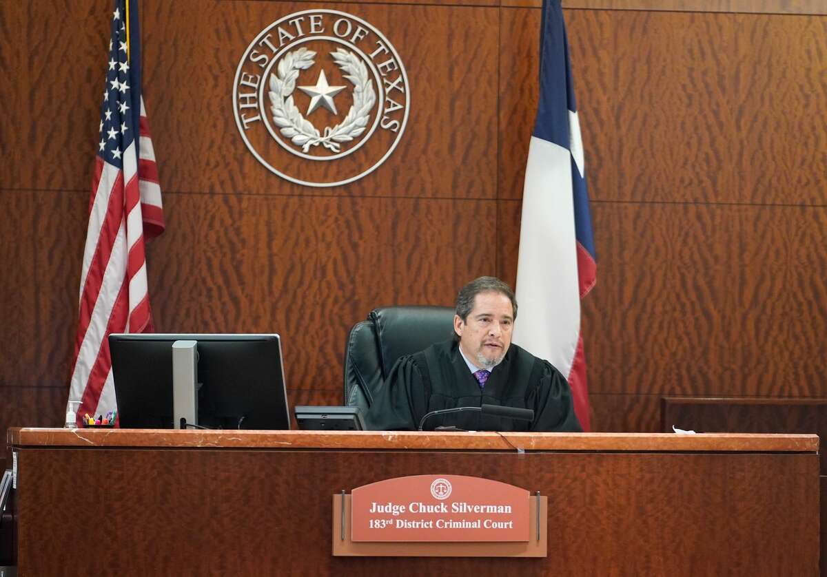 Judge Chuck Silverman presides over the death penalty trial of Lucky Ward Monday, Feb. 17, 2020 at the 183rd District Criminal Court in Houston. Ward is accused in the 2010 killings of a homeless woman, Reita Long, and a transgender woman identified in court records as Carlos Rodriguez.