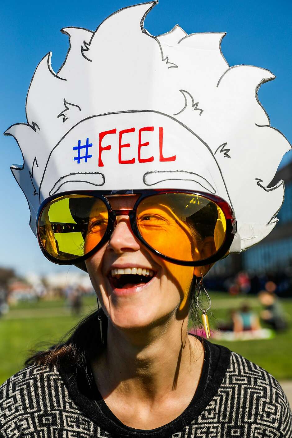 Liza Bender sports her Bernie Sanders campaign gear playing up the candidate’s glasses and hair.