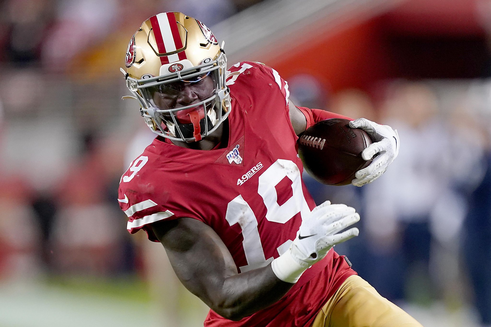 San Francisco 49ers wide receiver Deebo Samuel waits for the ball to be  snapped during the first half of an NFL football game against the New York  Giants on Thursday, Sept. 21