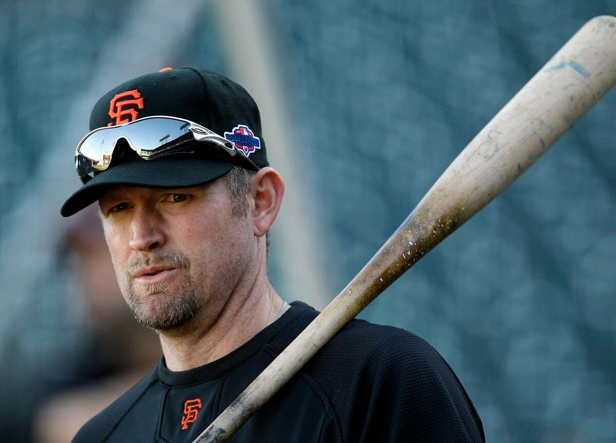 San Francisco Giants first baseman Aubrey Huff warms up before Game 2 of the National League division baseball series against the Cincinnati Reds in San Francisco, Sunday, Oct. 7, 2012. (AP Photo/Eric Risberg)