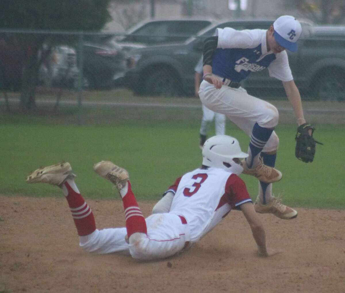 Pasadena-FBCA's Brayden Evans steals second base in the fifth inning, but he went no further as the Warriors stranded three potential go-ahead runs on the bases over their last two at-bats.