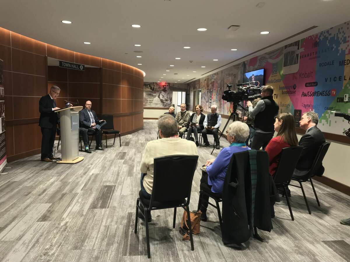 Albany Pro Musica artistic director José Daniel Flores-Caraballo, left at podium, at a Hearst Media Center press conference on Tuesday announcing a $200,000 grant funding student fellowships for its upcoming festival (photo by Amy Biancolli)