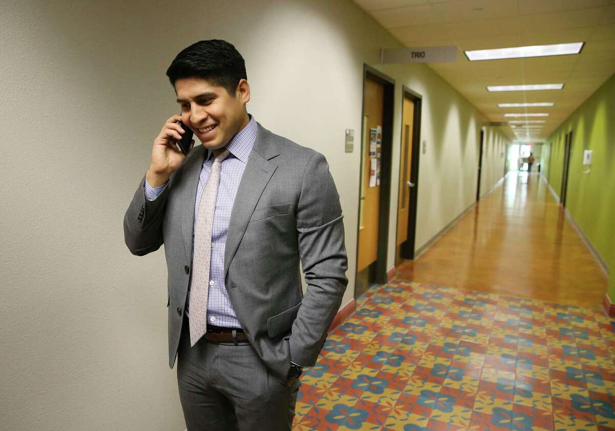 Former City Councilman Rey Saldaña calls his former Communities In Schools mentor, Dafney Bell, on Monday to let her know that the national education nonprofit has hired him as its next CEO. Saldaña benefited from Communities in Schools when he was in high school and now will move to Washington to run the organization.
