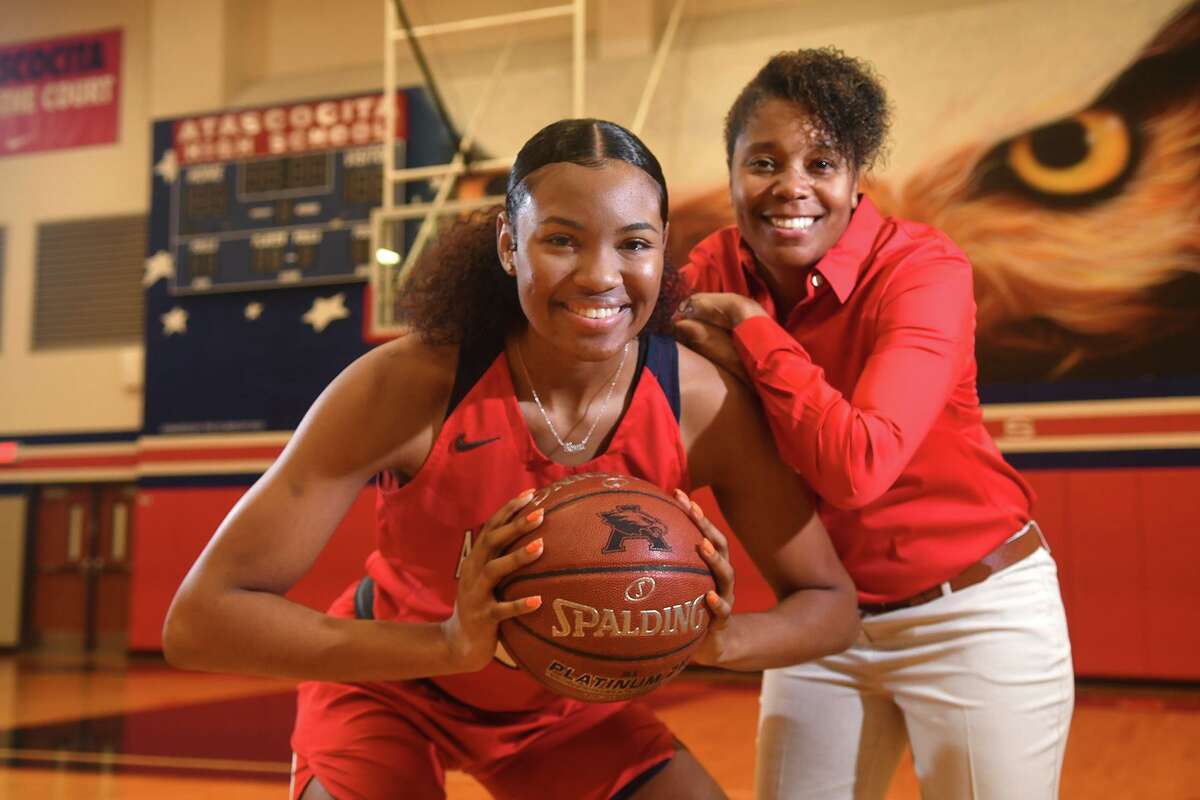 Atascocita senior post Elyssa Coleman was named district MVP this week. Here, she poses with girls basketball coach Veronica Johnson in the AHS gym on Jan. 6, 2020.