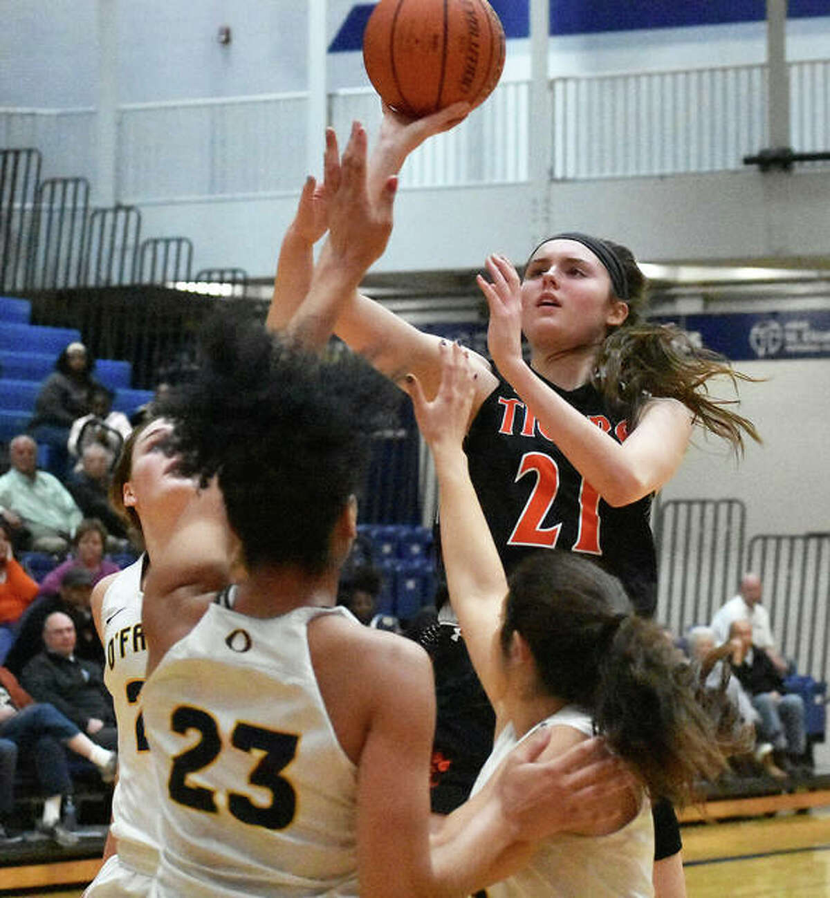 Edwardsville sophomore forward Elle Evans puts up a runner in the lane during the first half against O’Fallon.