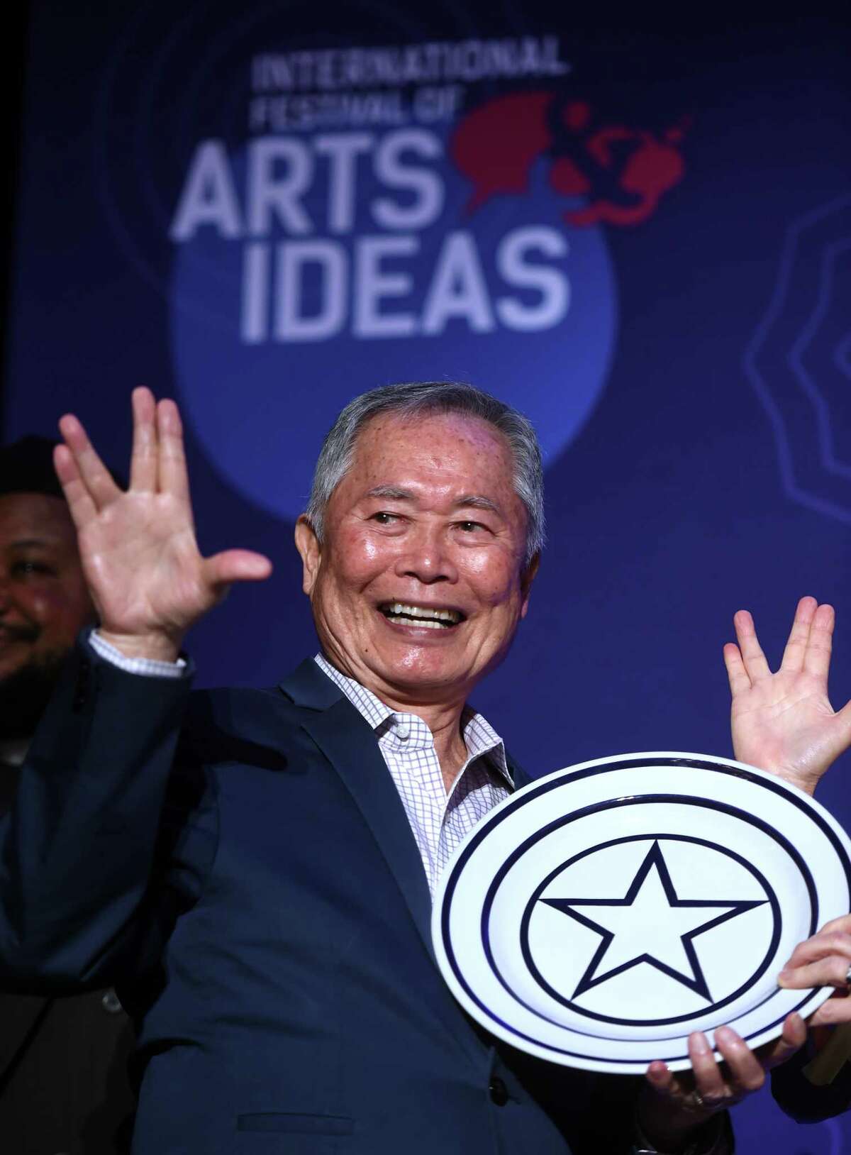 Actor and activist George Takei flashes the Vulcan salute after receiving the Visionary Leadership Award by the International Festival of Arts & Ideas at the Omni New Haven Hotel at Yale on February 18, 2020. The award honors a person whose work impacts the world.