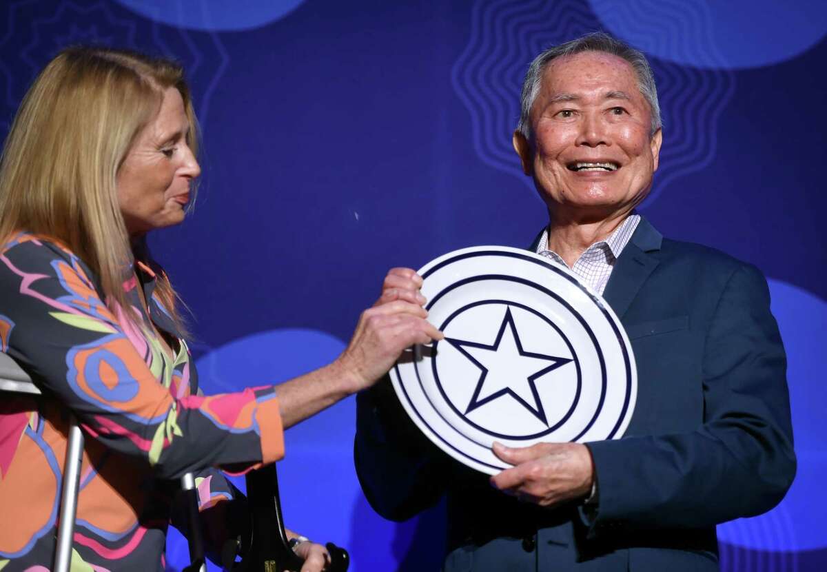Actor and activist George Takei receives the Visionary Leadership Award by the International Festival of Arts & Ideas from board member Dr. Kiki Kennedy at the Omni New Haven Hotel at Yale on February 18, 2020. The award honors a person whose work impacts the world.