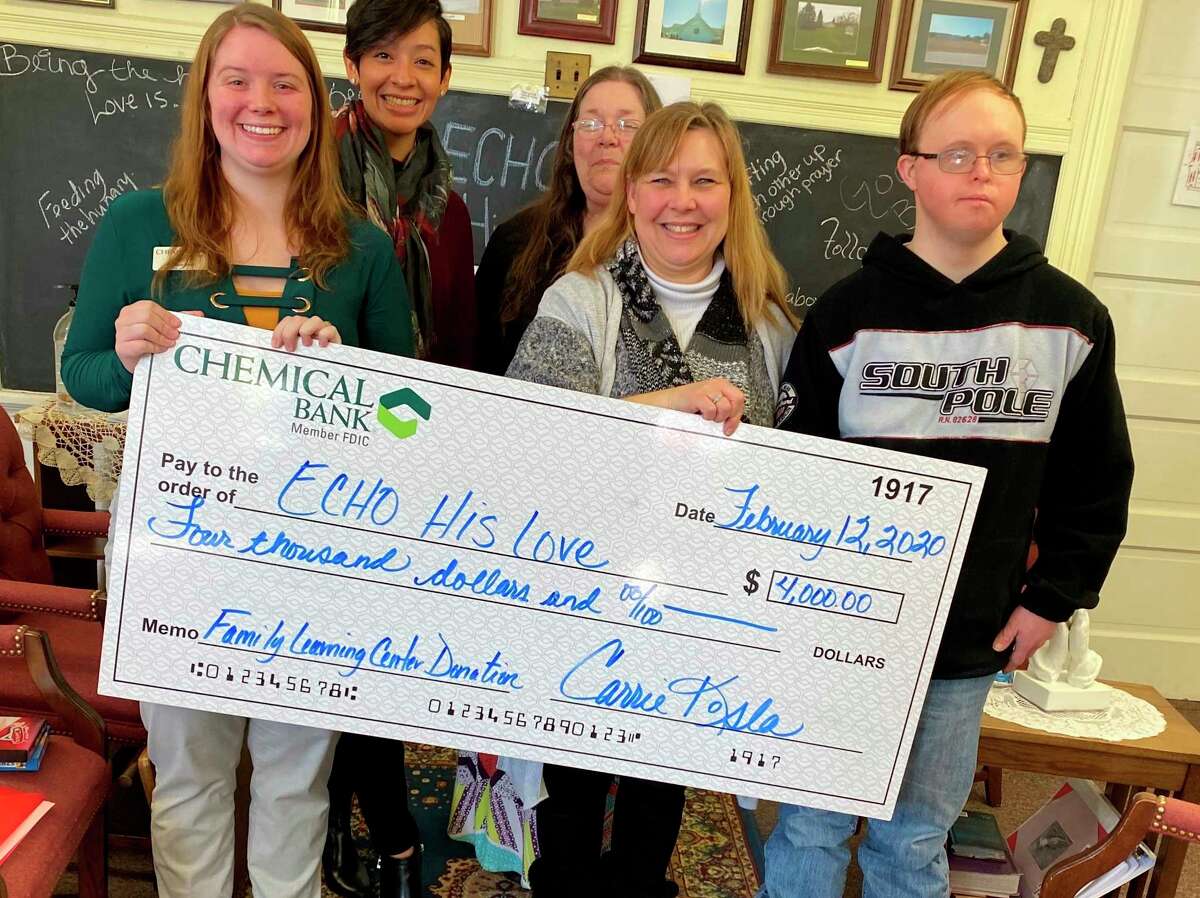 Chemical Bank recently donated $4,000 to the ECHO His Love Family Life Center. Pictured (left to right) are Miquaela Dault, relationship banker at Chemical Bank; Carrie Kosla, banking center manager at Chemical Bank; Robin Paulus, executive director, ECHO His Love; Lisa Clarke, Family Services Director, ECHO His Love; and Curtis, volunteer, ECHO His Love. (Courtesy photo)