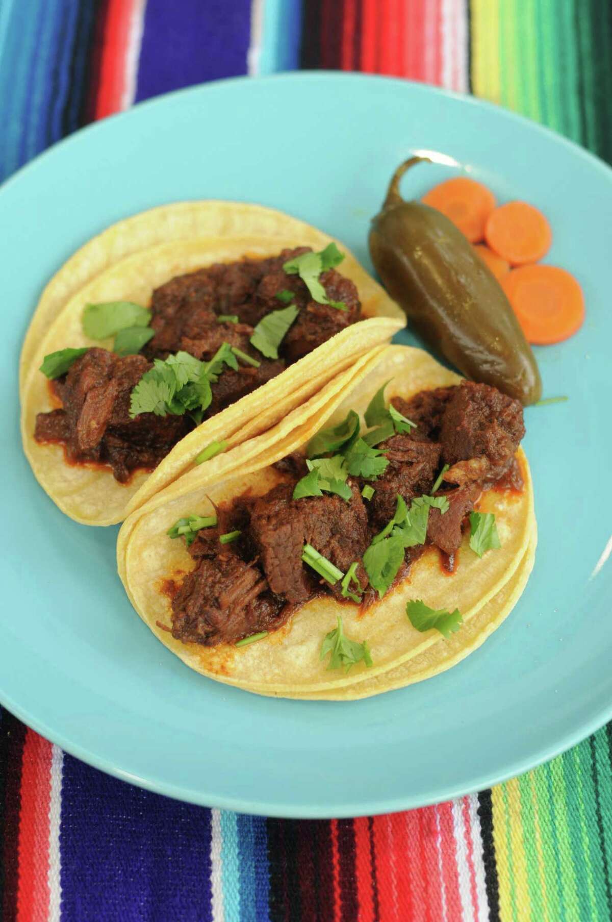 How to make your breakfast tacos — barbacoa, carne guisada, picadillo ...