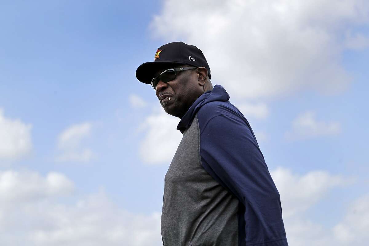 Houston Astros manager Dusty Baker roams the fields during spring training baseball practice Thursday, Feb. 13, 2020, in West Palm Beach, Fla. (AP Photo/Jeff Roberson)