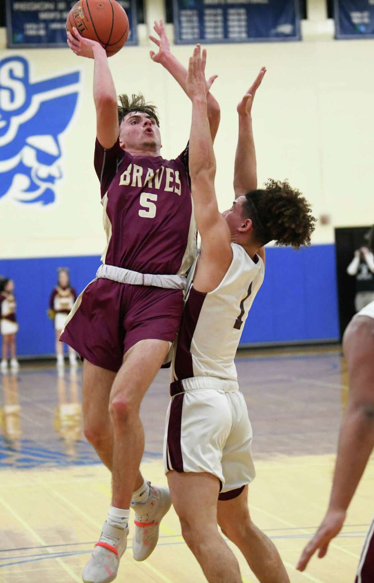 Fonda's Jackson Atty drives to the basket against Bishop Gibbons' Noah Foster during a game at Fulton Montgomery Community College on Tuesday, Feb. 18, 2020 in Johnstown, N.Y. (Lori Van Buren/Times Union)