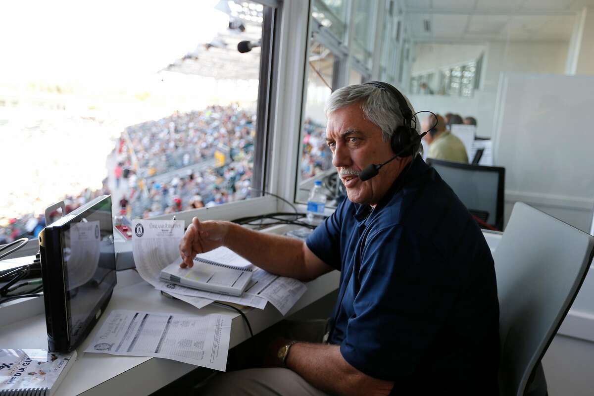 FILE PHOTO: Broadcaster Ray Fosse of the Oakland A's works from the pressbox during the game against the Chicago White Sox at Hohokam Stadium on March 8, 2015 in Mesa, Ariz. Fosse died Wednesday at 74.