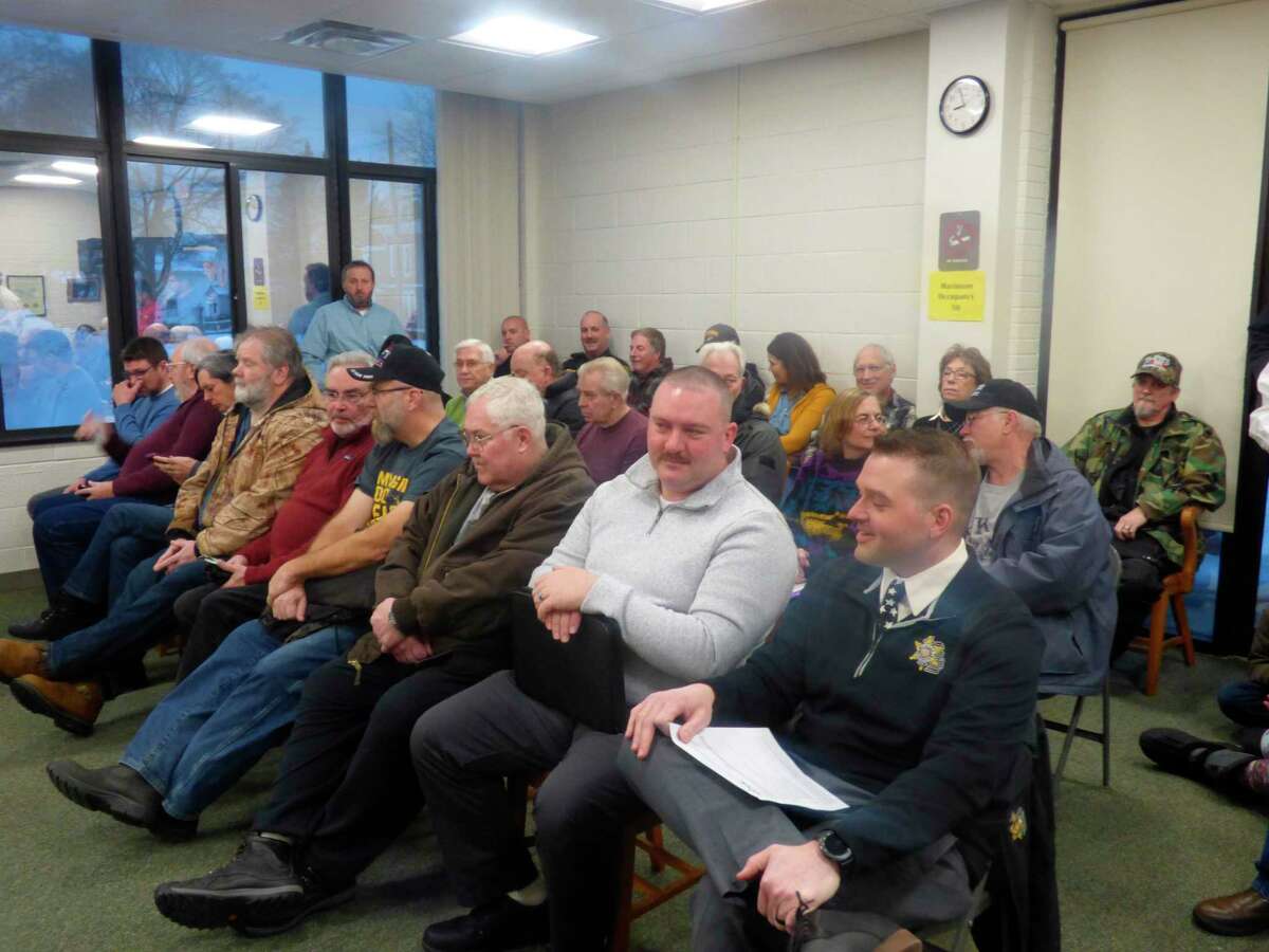 Community members fill the county boardroom to capacity during this month's meeting of the Manistee County Board of Commissioners. Residents arrived to voice their support for and opposition to a resolution aimed at declaring Manistee County a Second Amendment Sanctuary. (Scott Fraley/News Advocate)