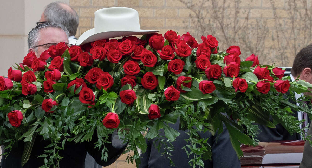 Clayton Williams is laid to rest 02/19/2020 as flowers on top of the casket, complete with his signiture hat, are brought out of First Presbyterian Church. Tim Fischer/Reporter-Telegram