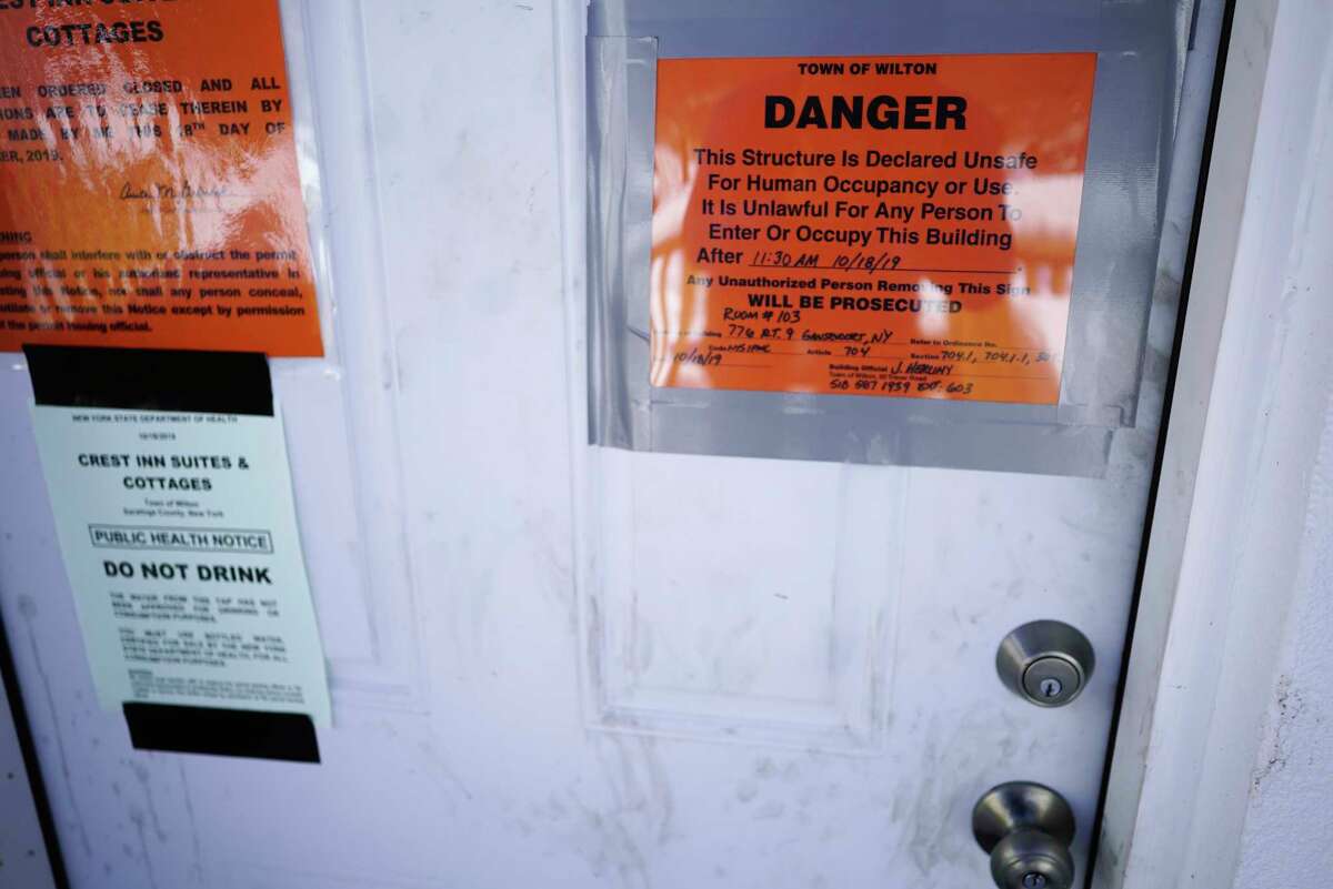 A view of one of the doors to a room at the now closed down Crest Inn motel, seen here on Wednesday, Feb. 19, 2020, in Gansevoort, N.Y. (Paul Buckowski/Times Union)