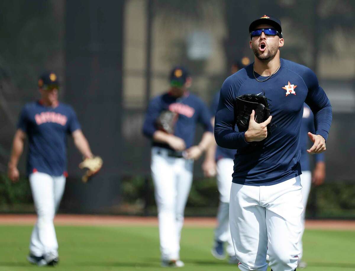 Houston Astros outfielder George Springer (4) yells as he and other outfielders come off the field during the Houston Astros spring training workouts at the Fitteam Ballpark of The Palm Beaches, in West Palm Beach , Wednesday, Feb. 19, 2020.