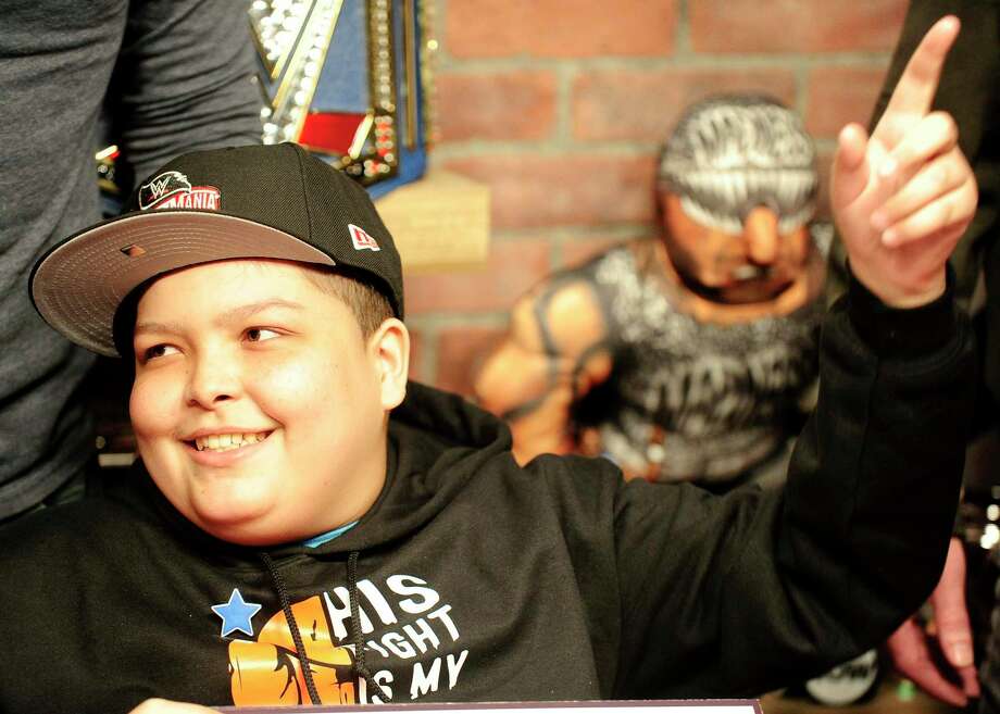 Make-A-Wish recipient Israel Rodriguez, a 12-year-old Hartford resident who has leukemia, learned during a live stream production of WWE's The Bump, from WWE Superstar Roman Reigns via Skype, that he will be attending WrestleMania. The surprise reveal was made at the digital and production studio's of the WWE in Stamford, Conn. on Feb. 19, 2020. The show is hosted by WWE personality Kayla Braxton. Photo: Matthew Brown / Hearst Connecticut Media / Stamford Advocate