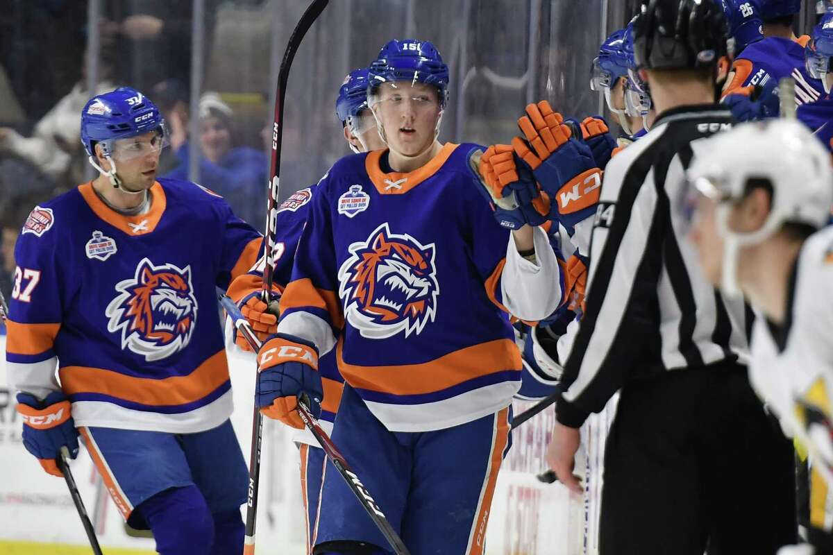 The Sound Tigers’ Simon Holmstrom (15) celebrates after scoring a goal against the Wilkes Barre-Scranton Penguins on Feb. 15 at Webster Bank Arena in Bridgeport, Conn.