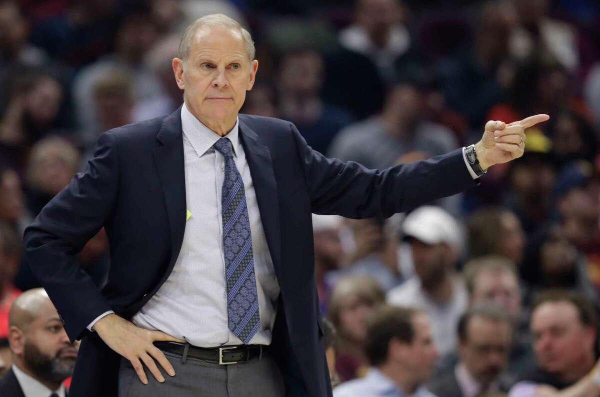 FILE - In this Friday, Dec. 20, 2019 file photo, Cleveland Cavaliers head coach John Beilein gives instructions to players in the first half of an NBA basketball game against the Memphis Grizzlies in Cleveland. Cavaliers first-year coach John Beilein will end a rough season by stepping down after 54 games, according to multiple reports Tuesday, Feb. 18, 2020.(AP Photo/Tony Dejak, File)
