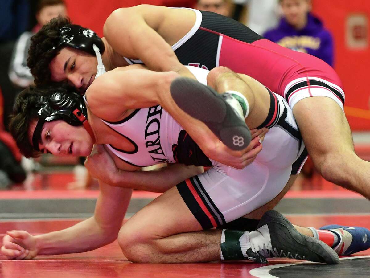 New Canaan’s Sung scores emotional threepeat in FCIAC wrestling
