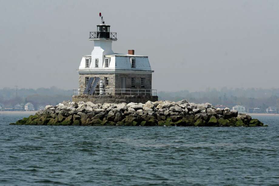 The view of Penfield Reef Lighthouse seen from the schooner SoundWaters as she sails on Long Island Sound during an educational trip with students from the Cardinal Sheehan Center spring vacation camp April 16th, 2012. Photo: Ned Gerard / Ned Gerard / Connecticut Post