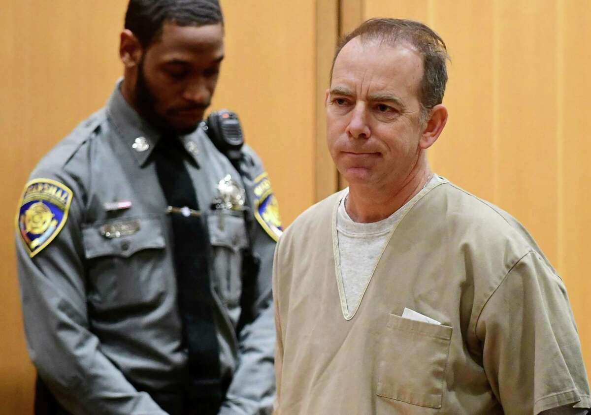 Kent Mawhinney, 54, appears in Stamford court with his attorneys to enter a plea to a conspiracy to commit murder charge in connection with the death of Jennifer Dulos Thursday, February 20, 2020, in Stamford, Conn.
