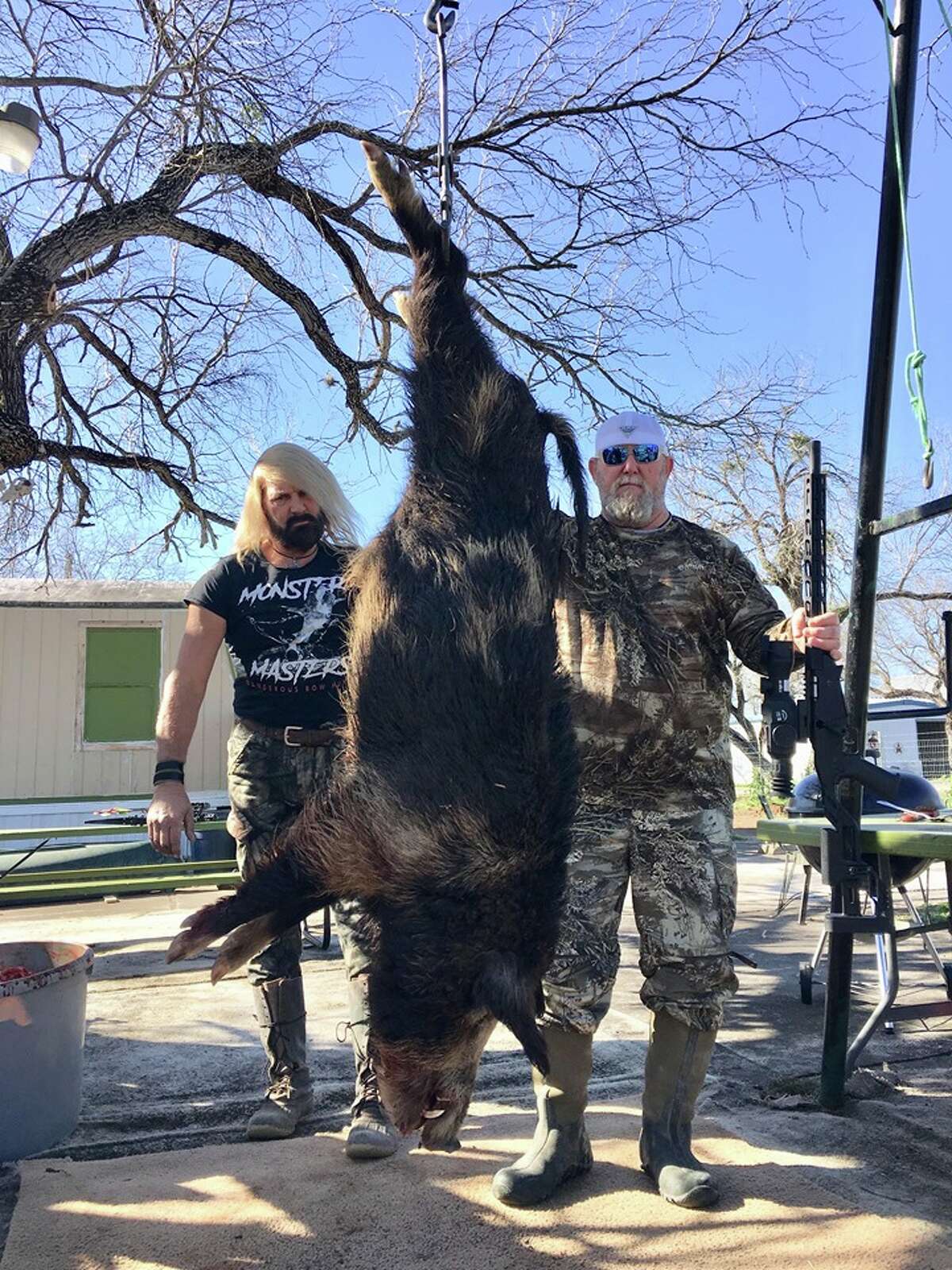 Tarkington men shoot and kill massive, nearly 500pound feral hog in