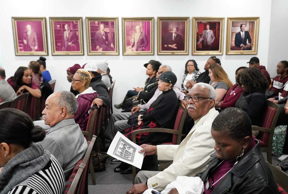 People attend the Texas Southern University’s board of regents meeting Thursday, Feb. 20, 2020 in Houston. They are meeting for the first time since giving their notice of termination for sidelined TSU president Austin Lane earlier this month.