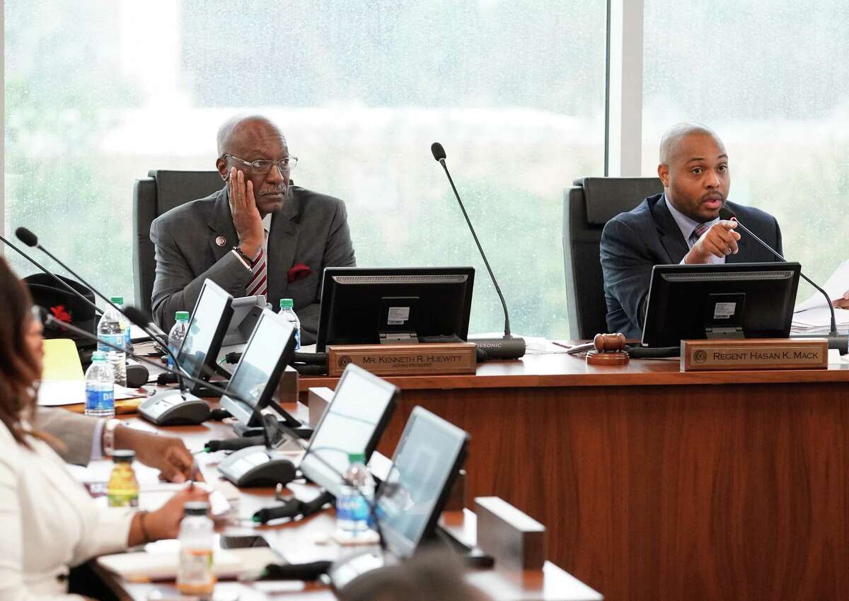 Texas Southern University’s board of regents Kenneth Huewitt, acting president, left, and Hasan Mack, chair, right, are shown during board meeting Thursday, Feb. 20, 2020 in Houston. The board is meeting for the first time since giving their notice of termination for sidelined TSU president Austin Lane earlier this month.
