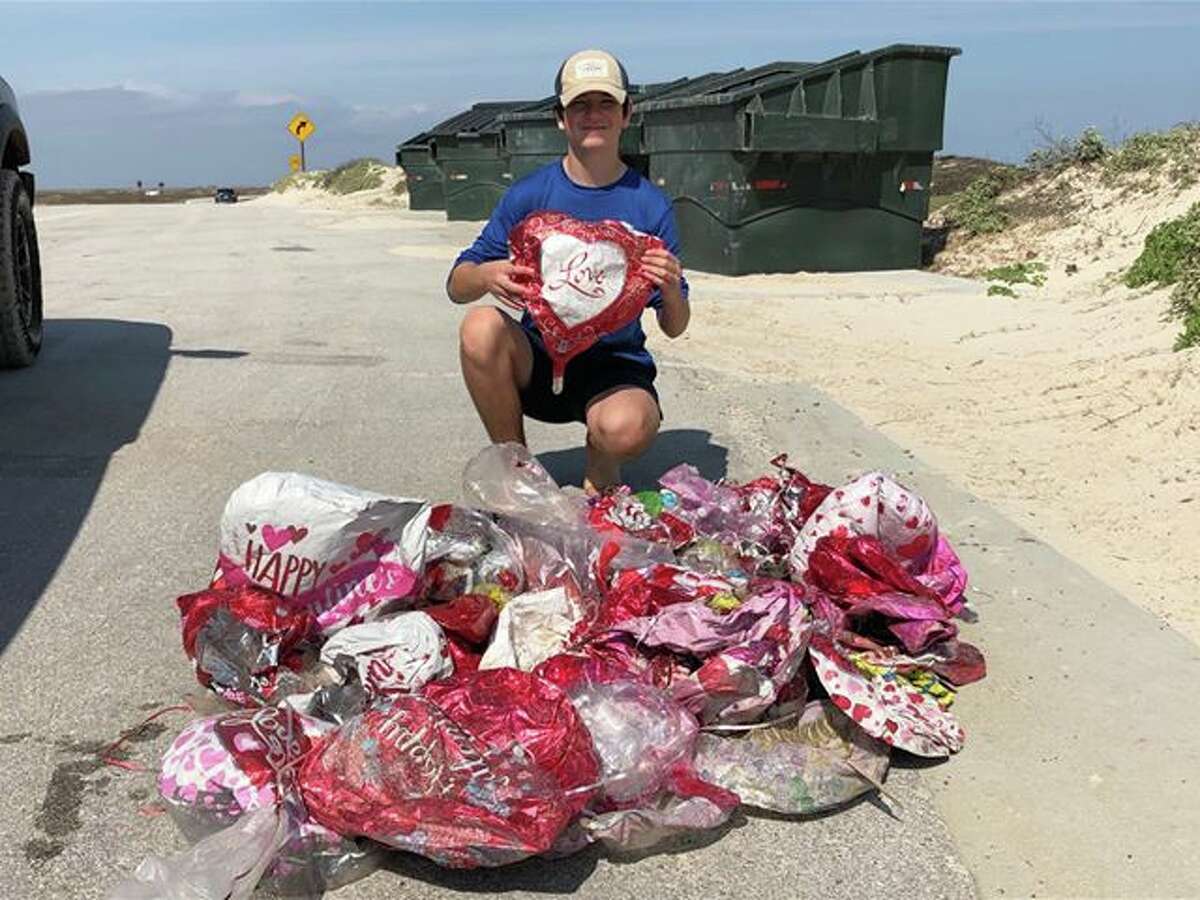 Last year, Viv Ibarra and her son Andrew picked up 67 Valentine's Day balloons at Padre Island National Seashore.