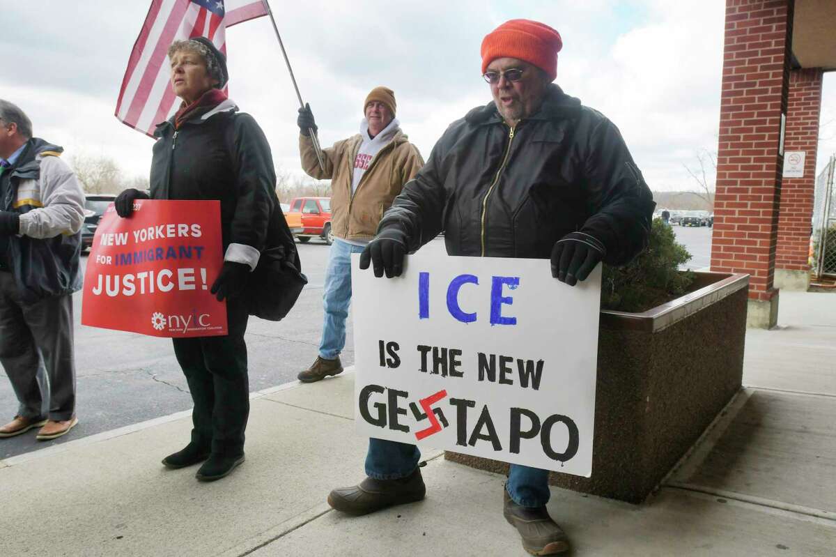 Protestors hold a rally outside the front doors of the Rensselaer County Sheriff's office on on Thursday, Feb. 20, 20202, in Troy, N.Y. (Paul Buckowski/Times Union)