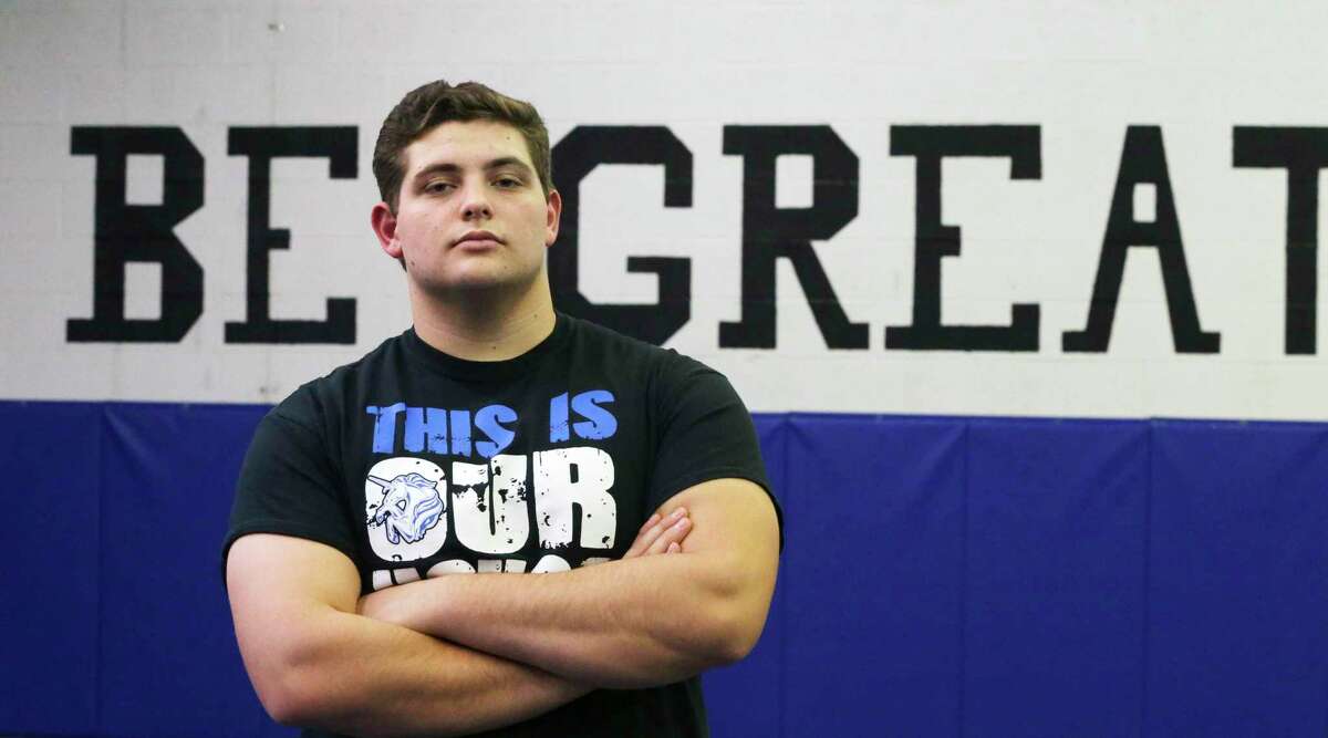 New Braunfels High School senior wrestler George Marsh stands in the wrestling gym at the high school on Feb. 19, 2020.