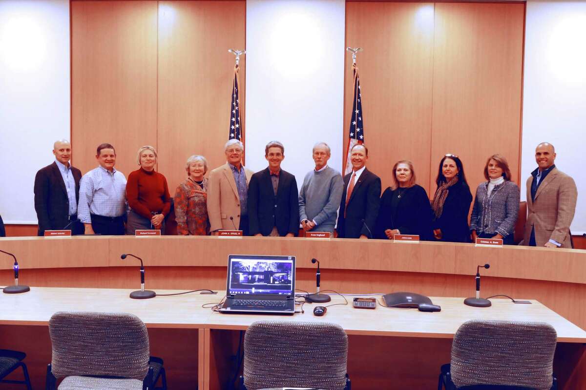 The new Town Council lined up for a picture after they chose their new leadership in Town Hall on Nov. 13, 2019. From left to right, Mark Gryzmski, Tom Butterworth, Liz Donovan, Penny Young, Richard Townsend, John Engel, Sven Englund, Steve Karl,  Christina Aquirre-Ross,  Maria Naughton, Robin Bates-Mason and Mike Mauro.