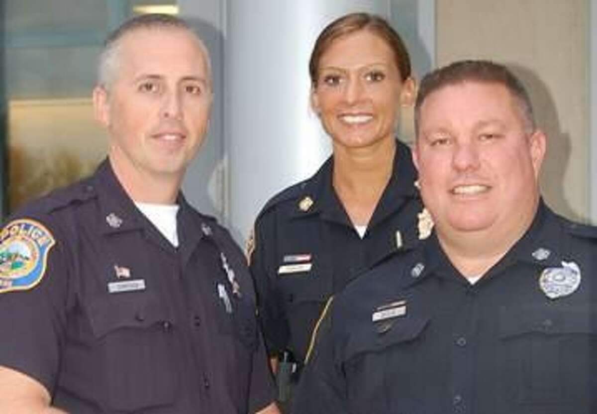 Three Westport police officers, from left, Howard Simpson, Det. Serenity Dobson and Ned Batlin, were recognized June 10 for their efforts to reduce drunk driving. The officers accepted their awards June 10 at the Connecticut chapter of Mothers Against Drunk Drivers (MADD) 24th Annual Appreciation Awards Ceremony at the Connecticut Police Academy in Meriden in 2010.