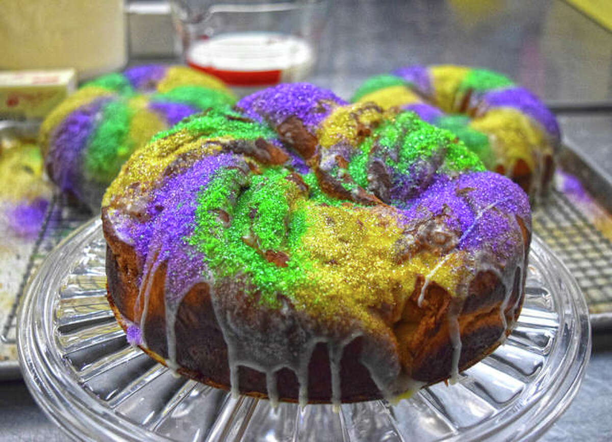 Some of the first King Cakes made for Fat Tuesday sit on display Thursday at A Little Taste of Heaven in Edwardsville.