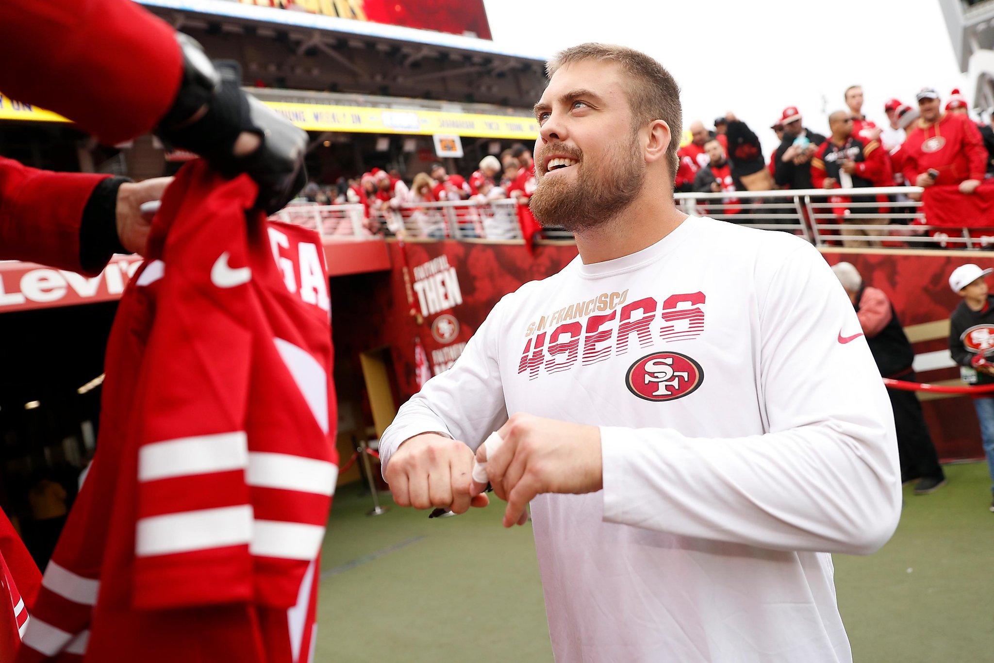 49ers center Ben Garland continues to protect and serve